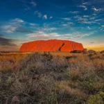 Why does Uluru turn red at sunset